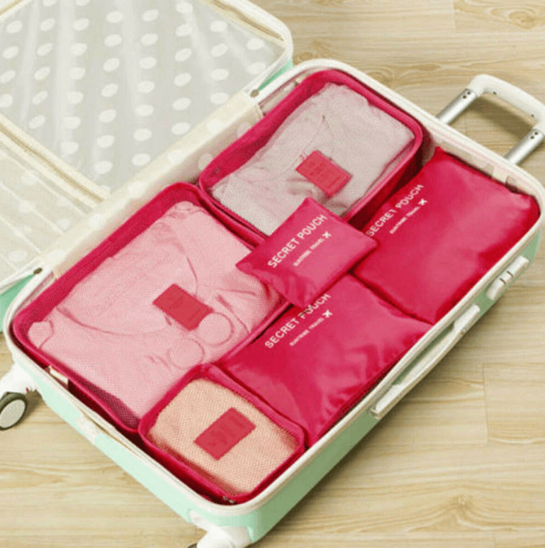 Efficient 12-piece unisex travel storage bags, a complete packing set for well-organized luggage.