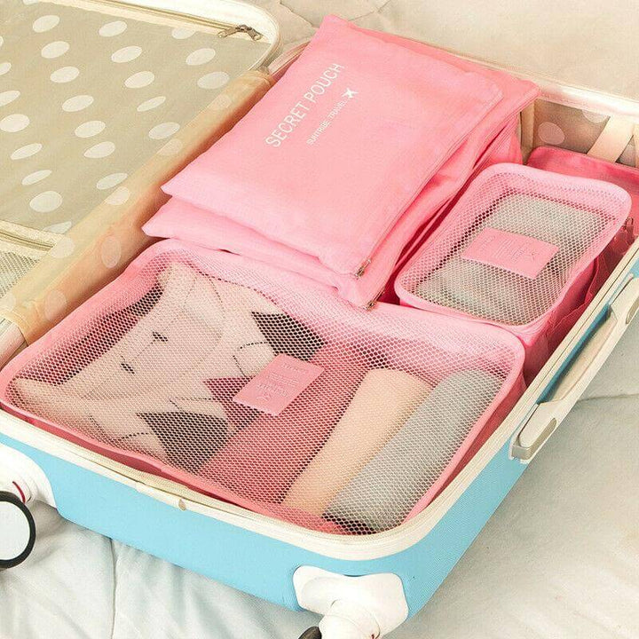 Comprehensive 12-piece unisex travel packing cube set for neat & compact suitcase organization.