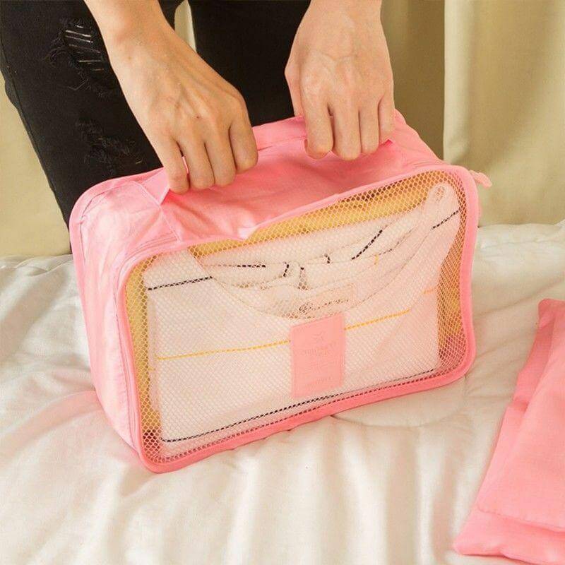 Unisex 12-piece travel organizer set for efficient space-saving & clutter-free luggage.