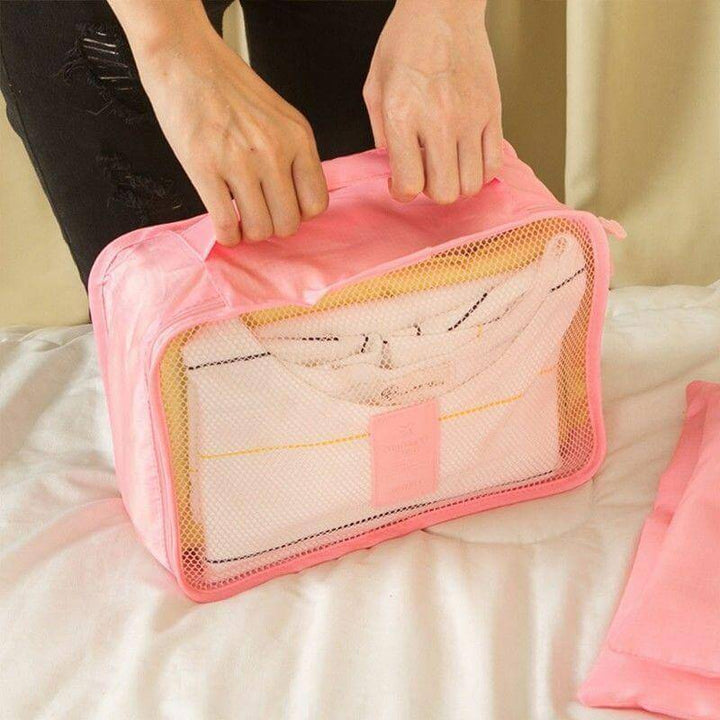 Unisex 12-piece travel organizer set for efficient space-saving & clutter-free luggage.