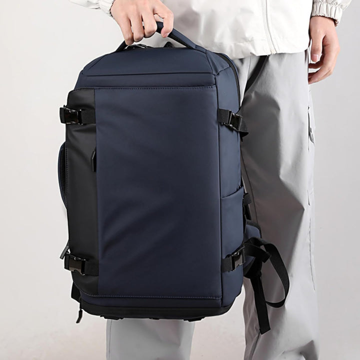 Unisex 15" waterproof laptop backpack, black, sleek design. Ideal for school, work, or travel.