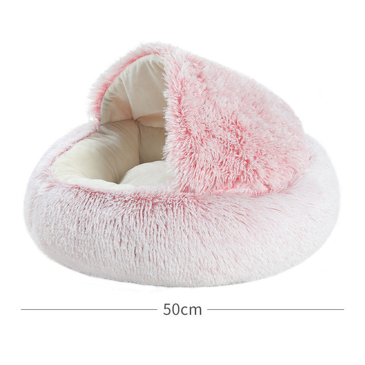 Cozy plush cat cave bed providing a warm hideaway for cats. Features a soft, comfortable interior for feline friends.