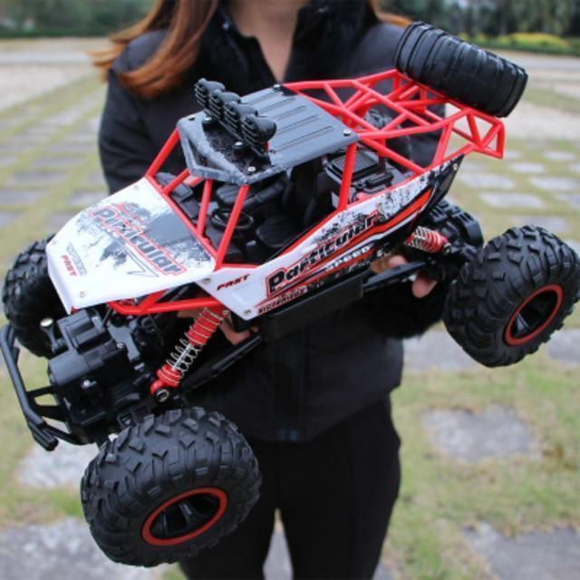 Close-up of a rugged 4x4 RC monster truck's tires and suspension, ready for off-road adventure. Durable toy.