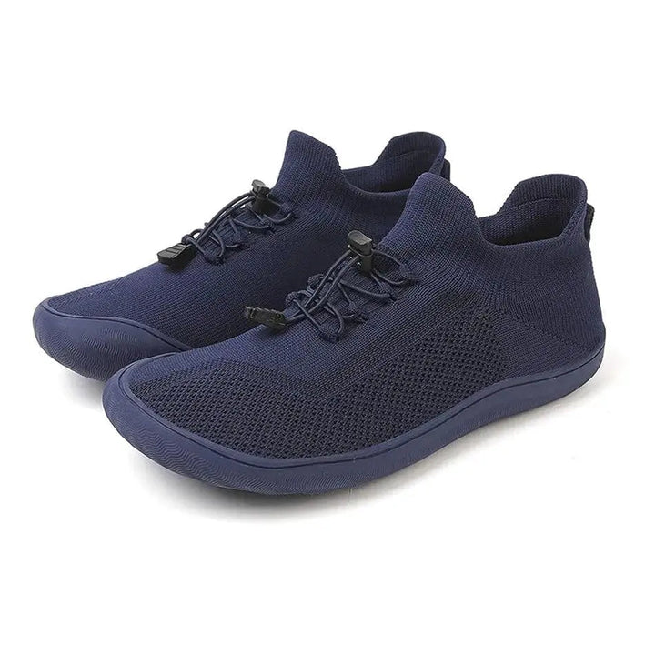 Minimalist unisex barefoot shoes with toggle laces, offering comfort for walking & activity.