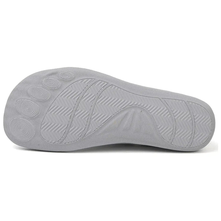 Comfortable barefoot shoes for active men & women, featuring a secure toggle lace system.