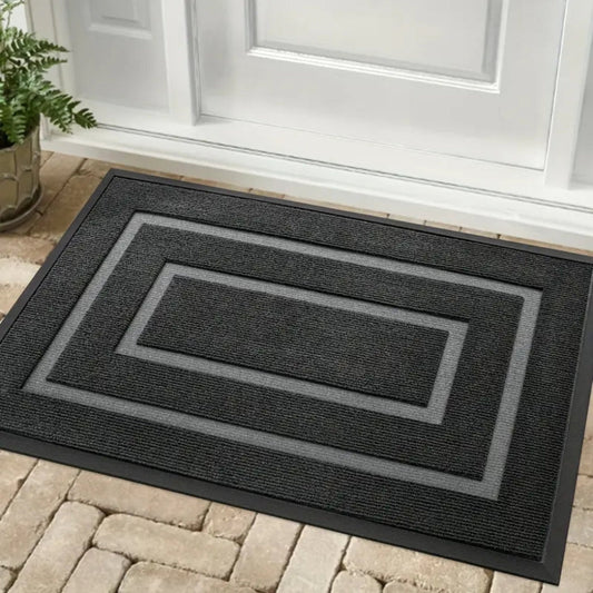 Unisex all-season black rubber doormat, waterproof and anti-slip for entryway, indoor/outdoor use, durable home decor.