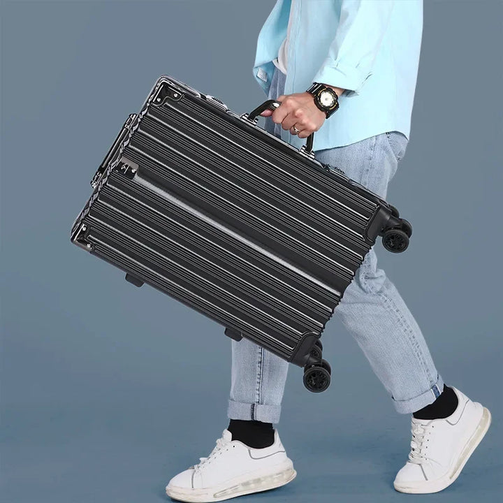 Close-up of secure aluminum frame hard-shell suitcase. Durable unisex luggage, perfect for travel.