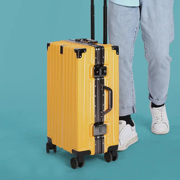 Unisex hard-shell suitcase with aluminum frame & 360° spinner wheels. Secure & durable travel luggage.