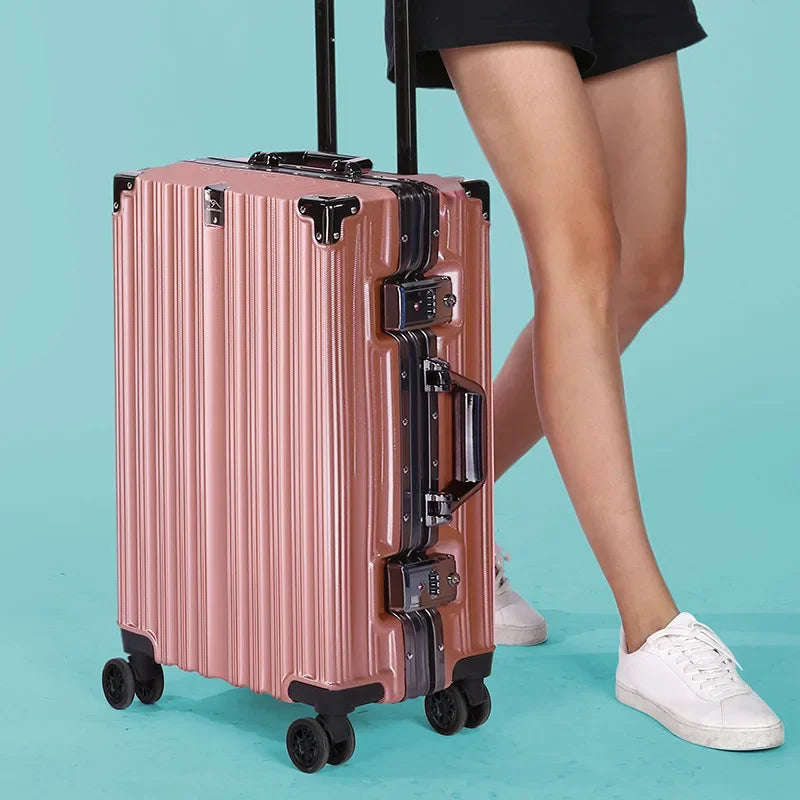 Unisex hard-shell suitcase, grey, featuring a robust aluminum frame for secure and durable travel.