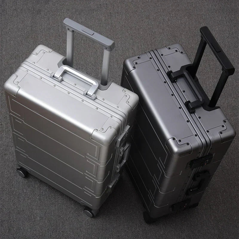 Sleek aluminum hardshell carry-on suitcase, integrated TSA lock, smooth spinner wheels.