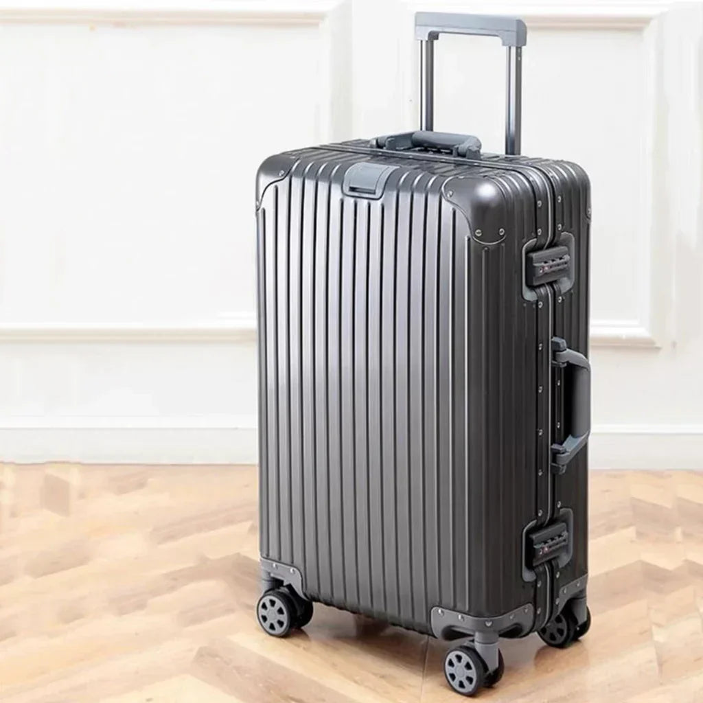 Unisex aluminum-magnesium hardshell suitcase, durable & lightweight for travel.
