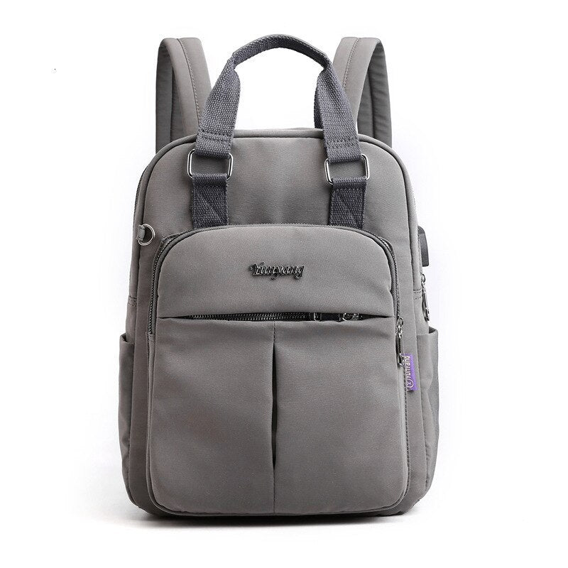 USB charging tech backpack for laptops. Water-resistant & anti-theft design. Power your devices on the go.