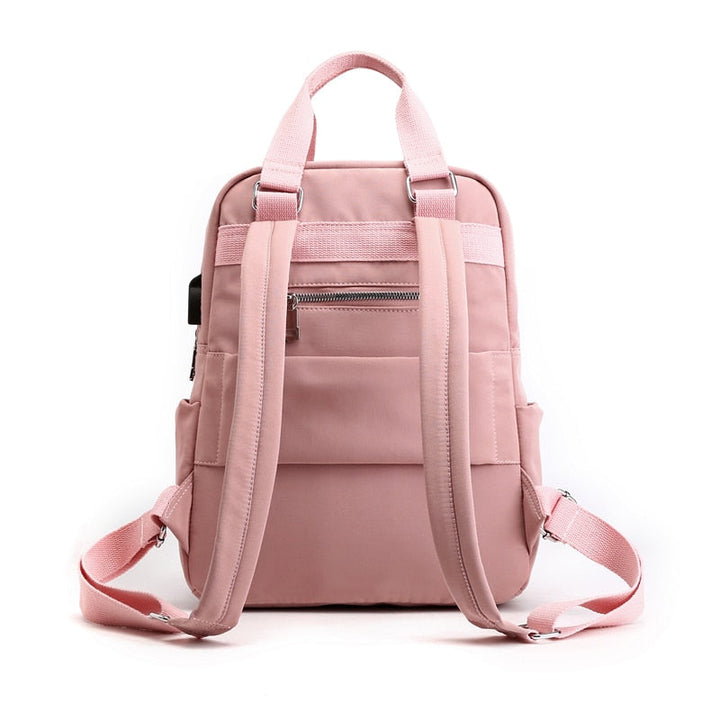 Laptop anti-theft backpack. Water-resistant, USB charging, secure compartments. Protect your gear for school or work.