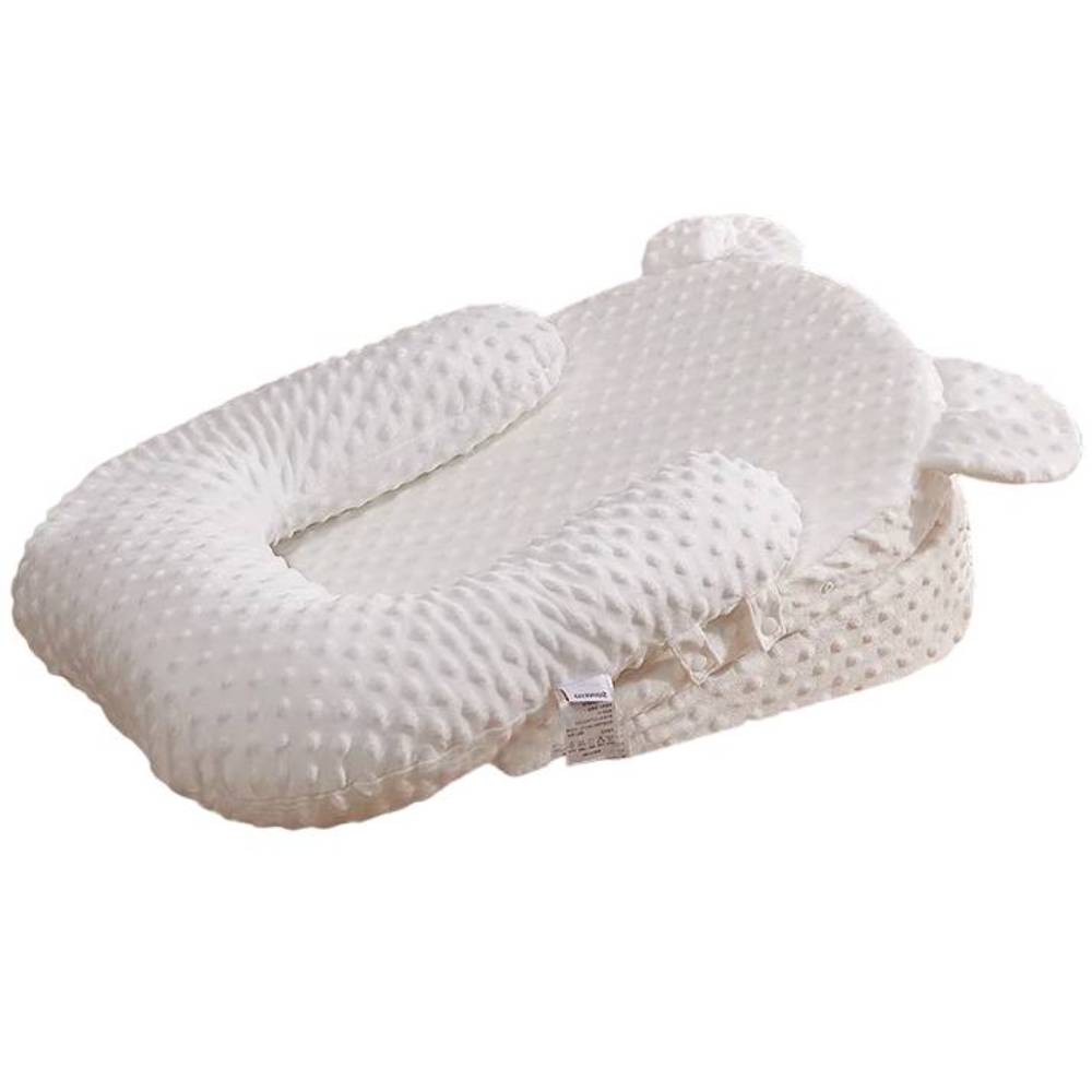 Unisex baby anti-spit up feeding pillow, providing comfortable meals & preventing reflux for infants.