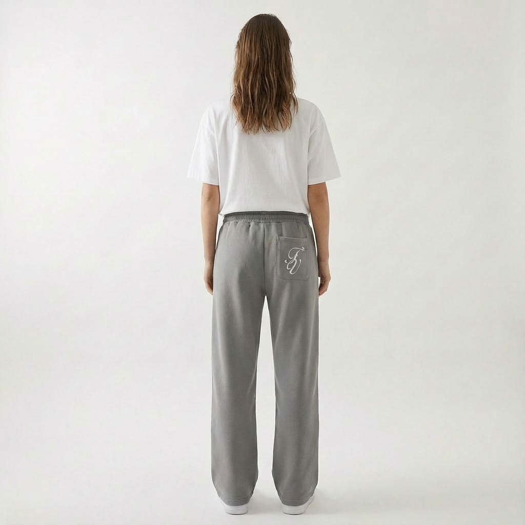 Relaxed fit gray unisex joggers featuring convenient side pockets, ideal for loungewear.