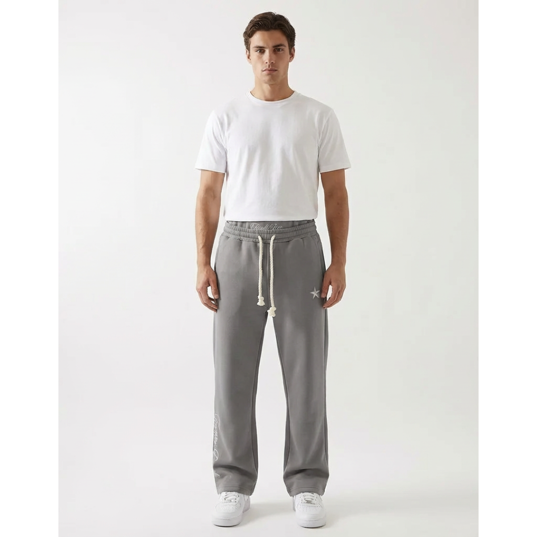 Black baggy unisex joggers, perfect for streetwear or everyday athletic comfort, with pockets.