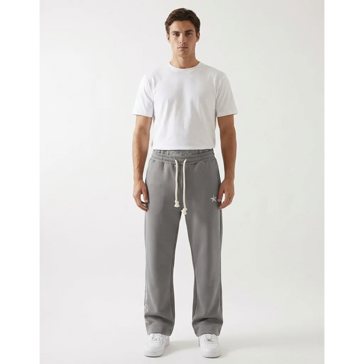 Black baggy unisex joggers, perfect for streetwear or everyday athletic comfort, with pockets.