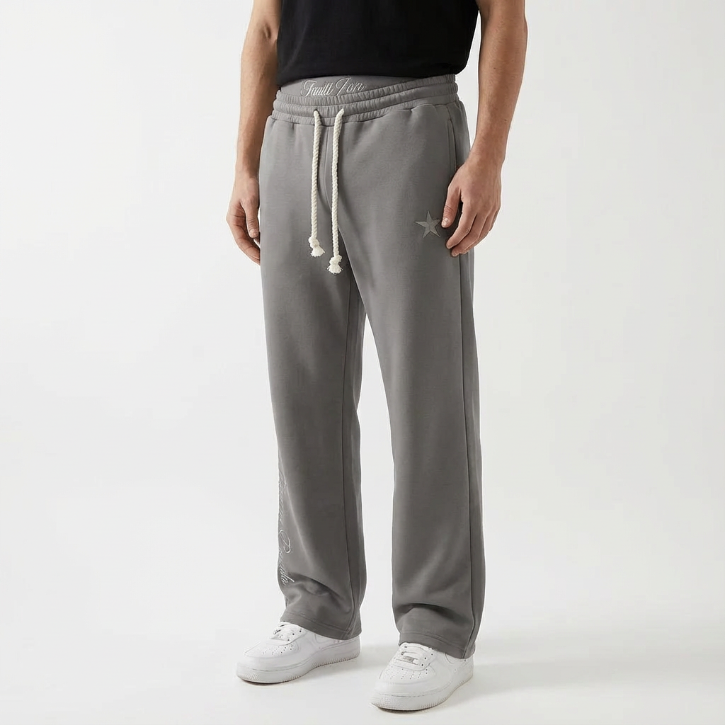 Loose fit unisex joggers with spacious pockets, offering a relaxed and comfortable casual style.