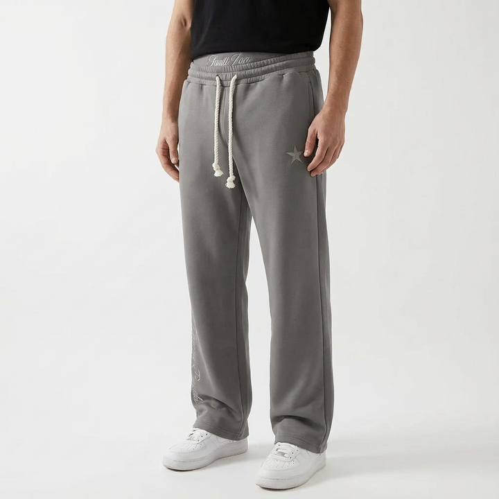 Loose fit unisex joggers with spacious pockets, offering a relaxed and comfortable casual style.