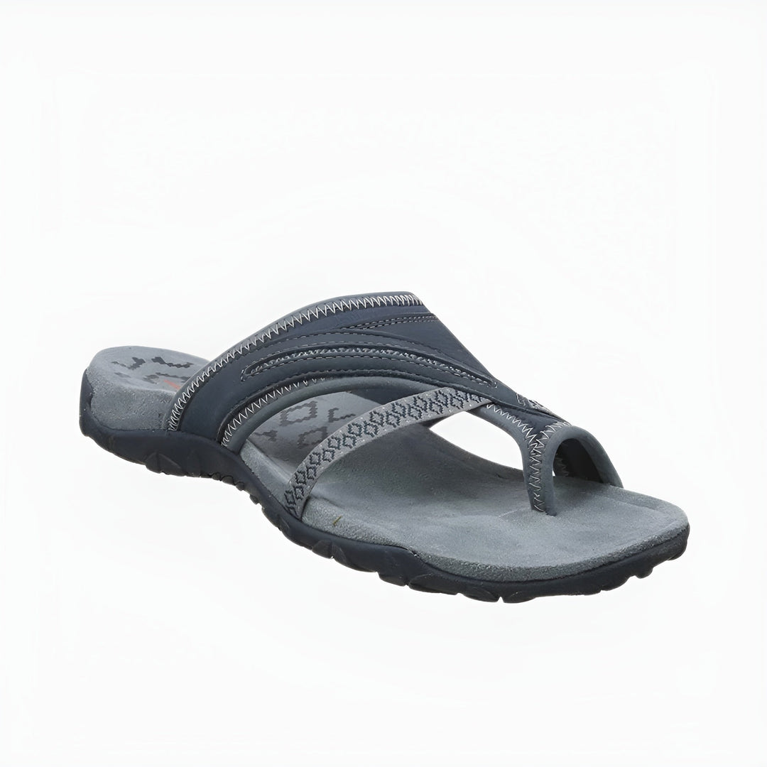 Foot in a unisex orthopedic arch support sandal, showing ergonomic design for comfort