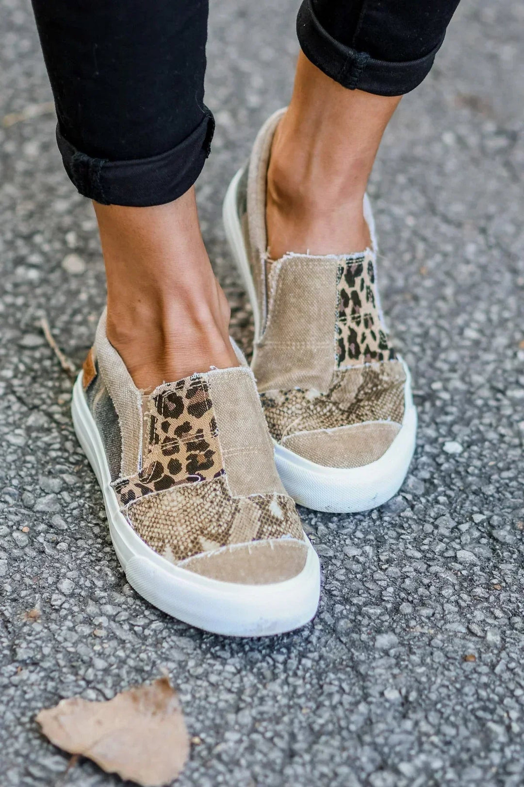 Side view of a unisex slip-on shoe, highlighting its arch support and shock-absorbing sole