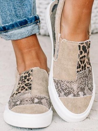 Navy blue unisex slip-on shoes, combining everyday style with essential arch support