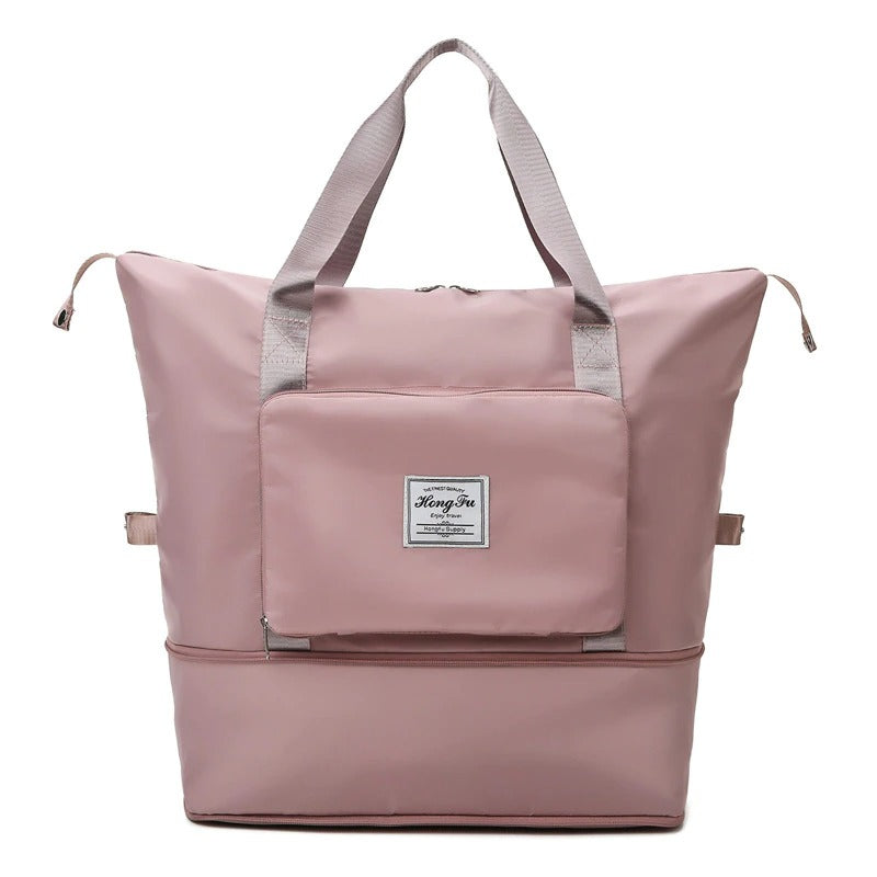 Lightweight expandable carry-all weekender travel bag in sleek black, ideal for men & women's trips.