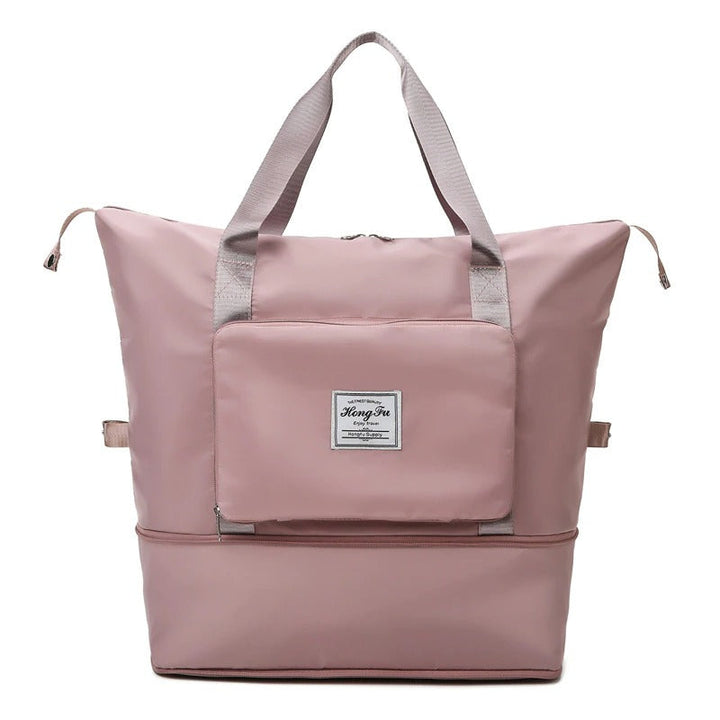 Lightweight expandable carry-all weekender travel bag in sleek black, ideal for men & women's trips.