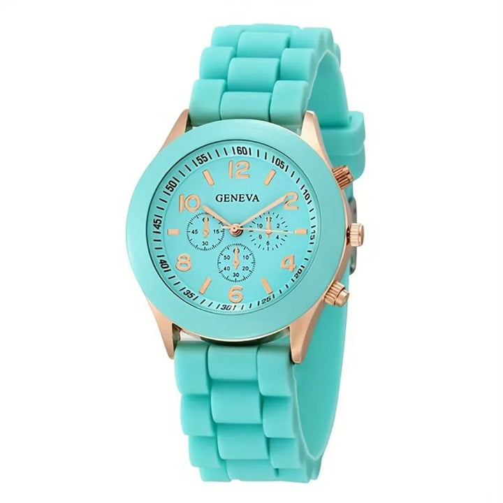 Close-up of a unisex casual quartz watch with its smooth silicone strap and clear dial.