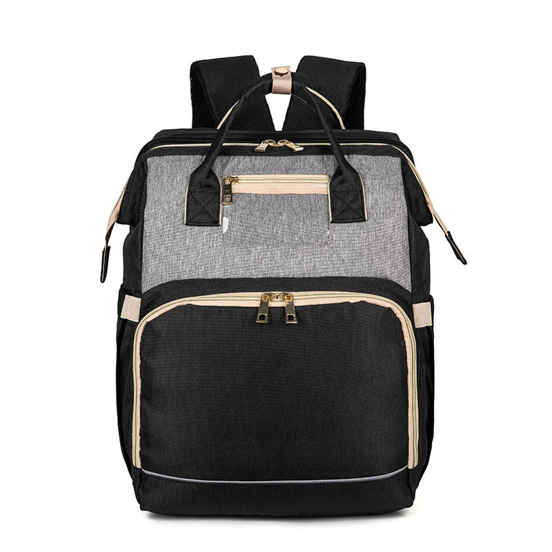 Smart convertible nappy bag & portable bassinet. Features waterproof design & multi-pockets for baby essentials.