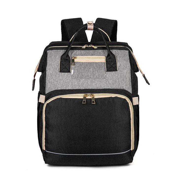 Smart convertible nappy bag & portable bassinet. Features waterproof design & multi-pockets for baby essentials.