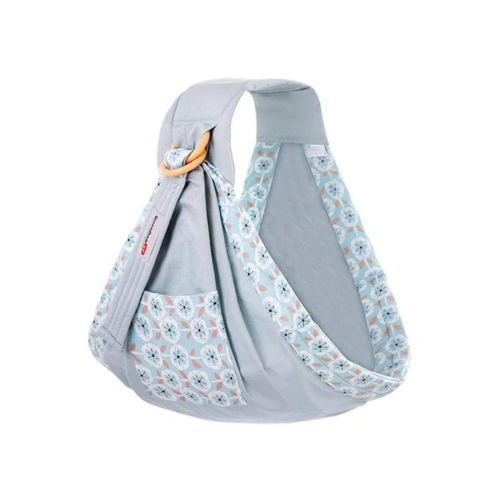 Floral cotton baby wrap carrier & nursing cover. Comfortable & hands-free for breastfeeding or infant carrying.