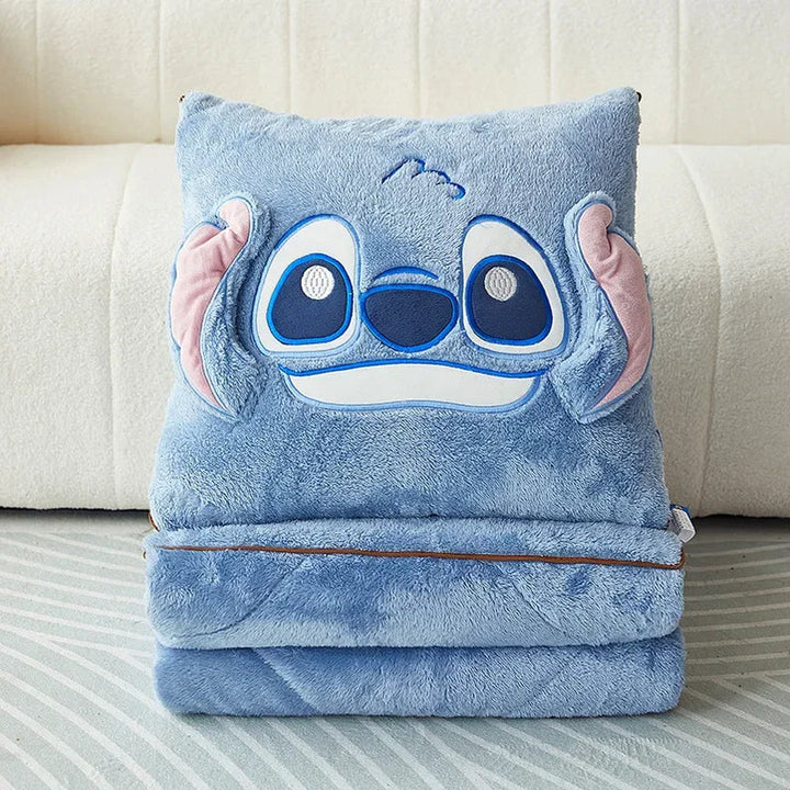 Unisex cuddly plush blanket & cushion set, perfect for cozy home comfort & warmth.