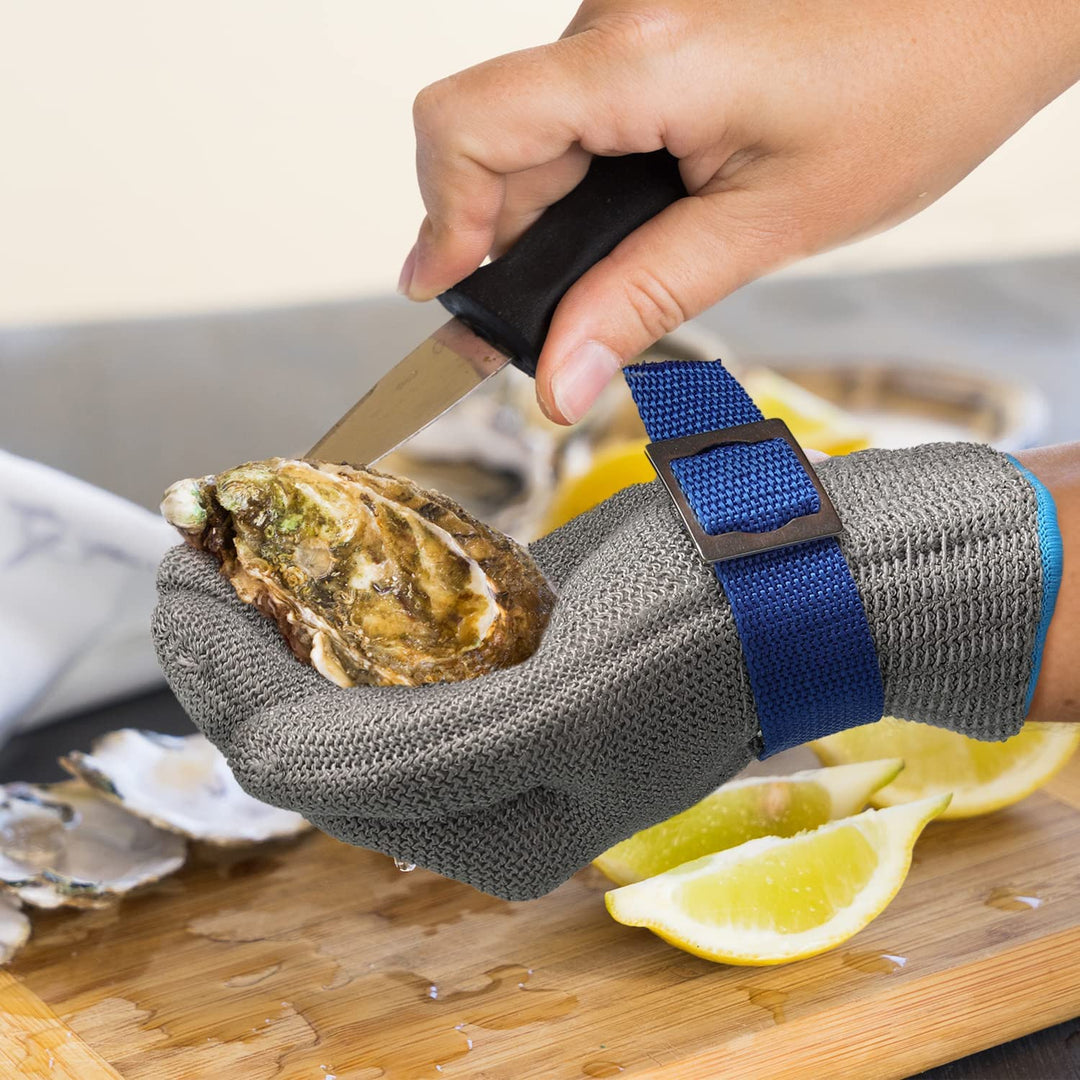 Professional kitchen protective gear: cut-resistant glove for safe meat processing & food handling.
