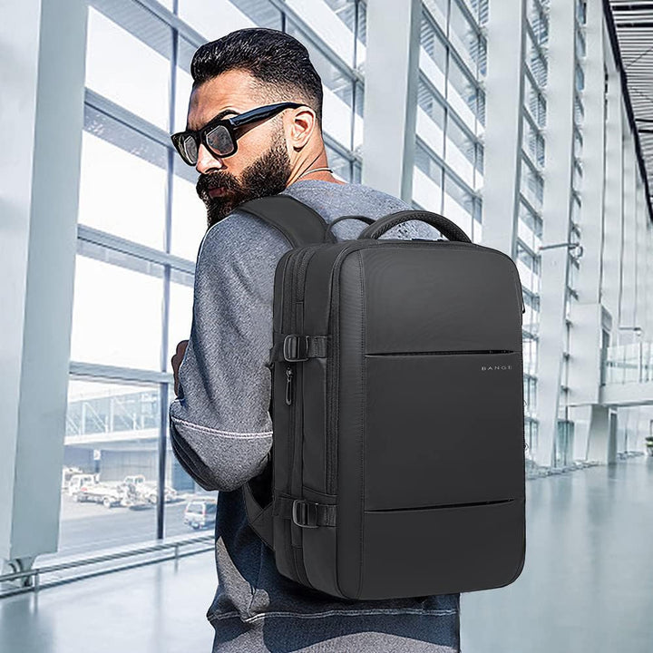 Secure anti-theft travel backpack, 26-45L, with hidden pockets & laptop sleeve.
