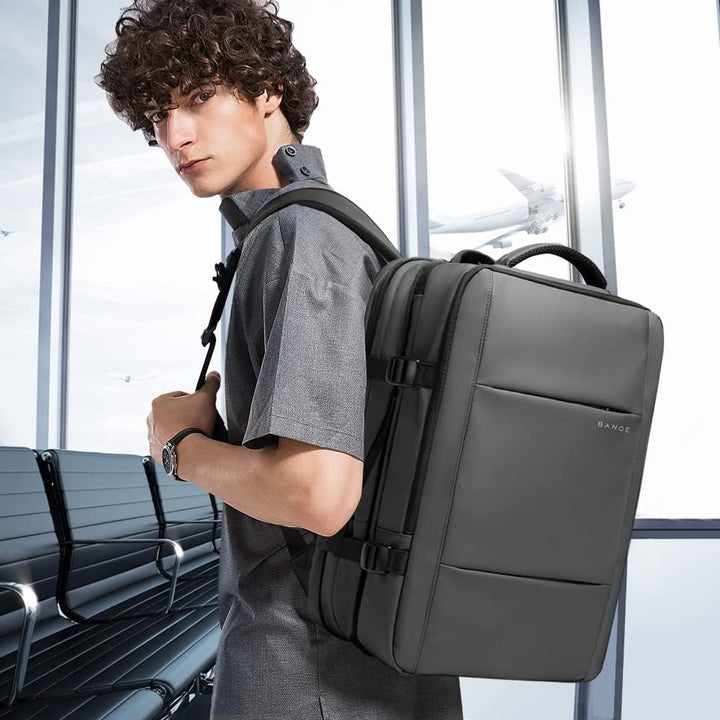 Travel backpack with adjustable capacity, 26-45L, waterproof for all weather.