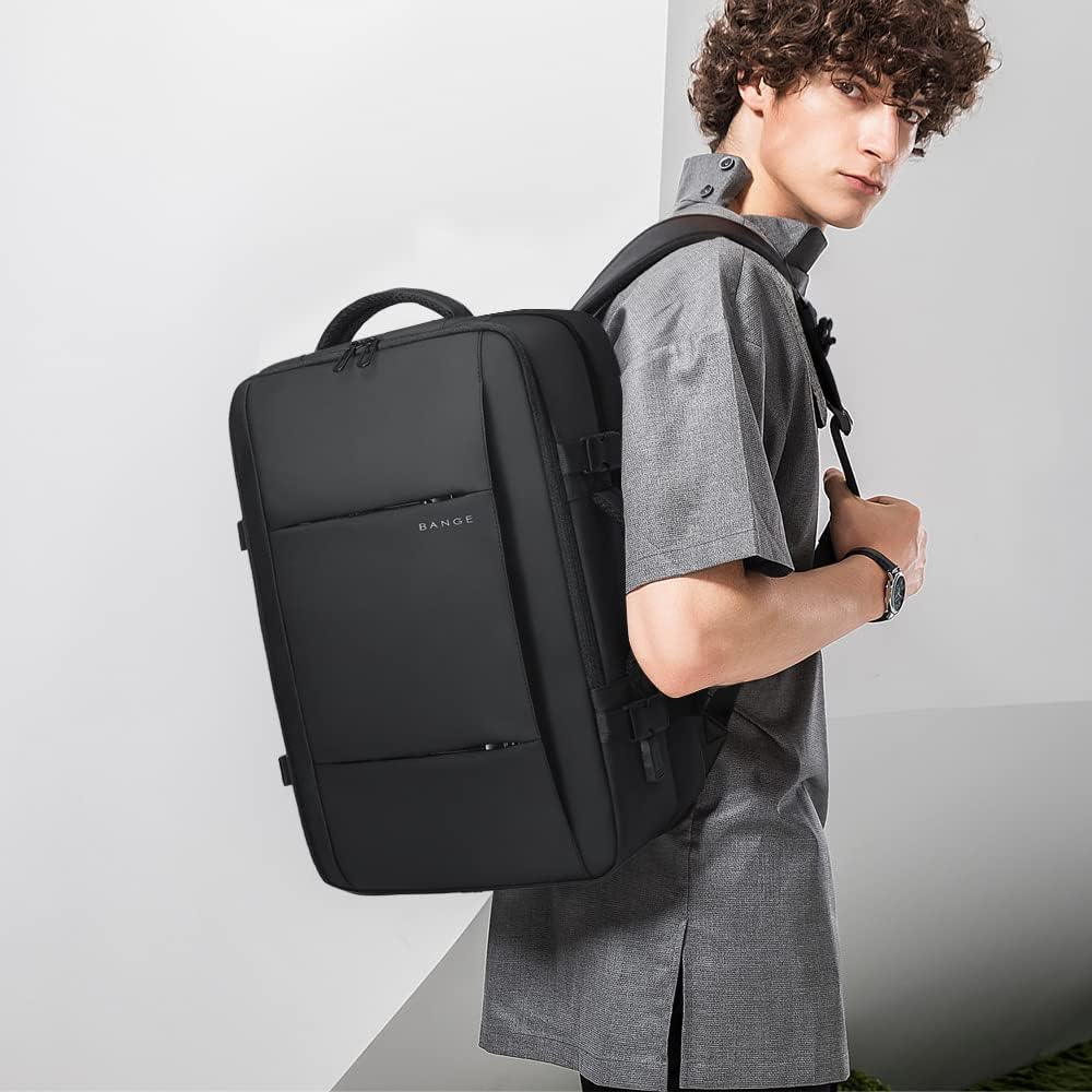 Grey unisex travel backpack, 26-45L, with secure laptop sleeve & waterproof material.