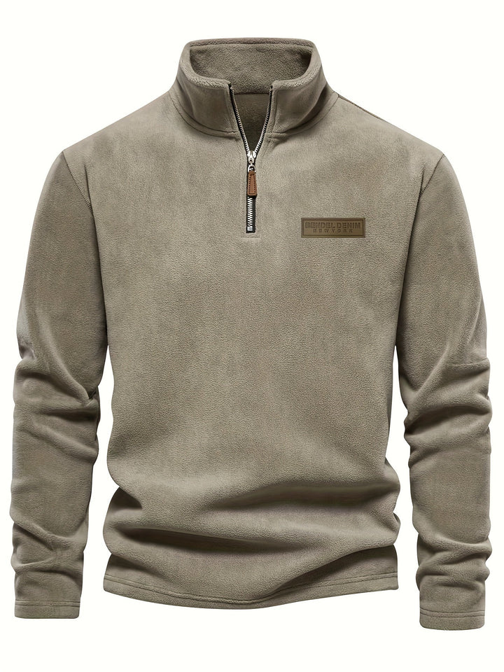 Cozy fleece half-zip pullover for men & women, ideal for warmth during winter activities & everyday comfort.