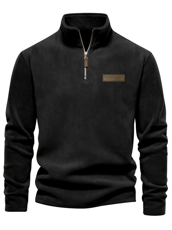 Outdoor-ready unisex half-zip pullover, providing cozy warmth and comfort for cool fall and winter days.