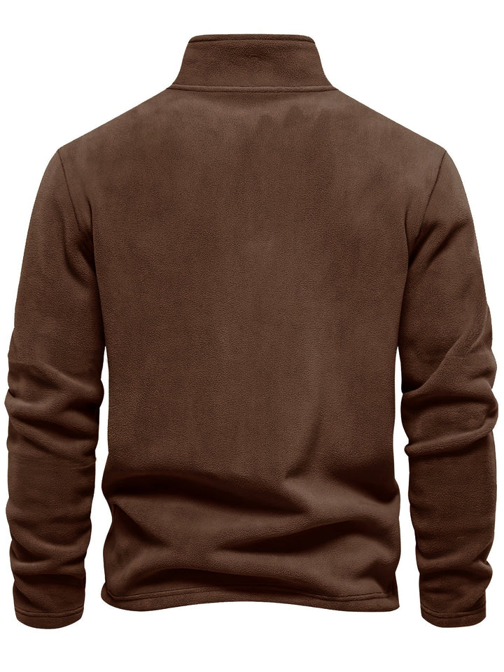 Essential unisex warm pullover with half-zip, offering cozy comfort and easy layering for cold weather.