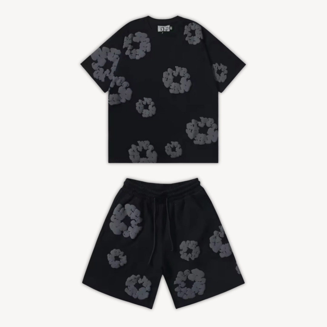 Matching floral two-piece set for women. Short sleeve tee & patterned shorts, a trendy summer casual outfit.
