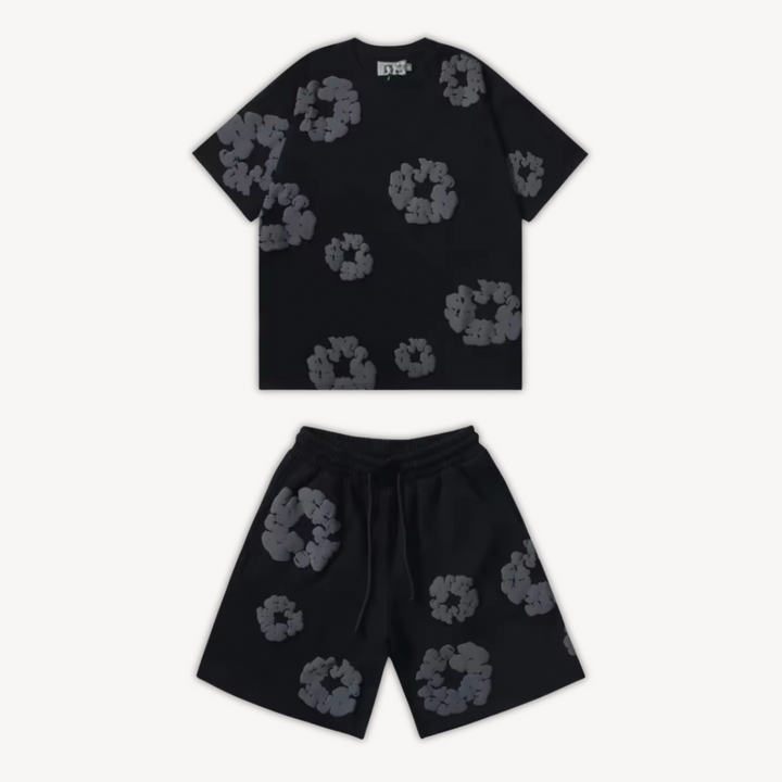 Matching floral two-piece set for women. Short sleeve tee & patterned shorts, a trendy summer casual outfit.