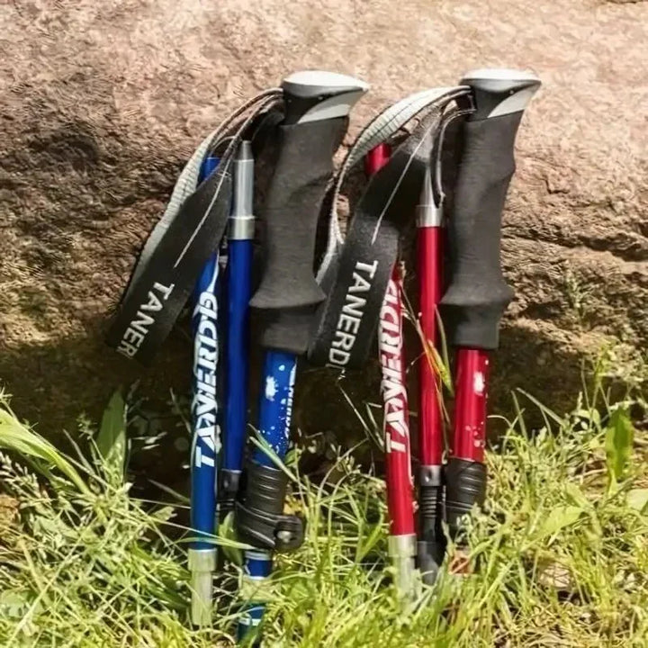 Durable aluminum trekking pole, foldable design. Essential lightweight outdoor gear for hikers & adventurers.