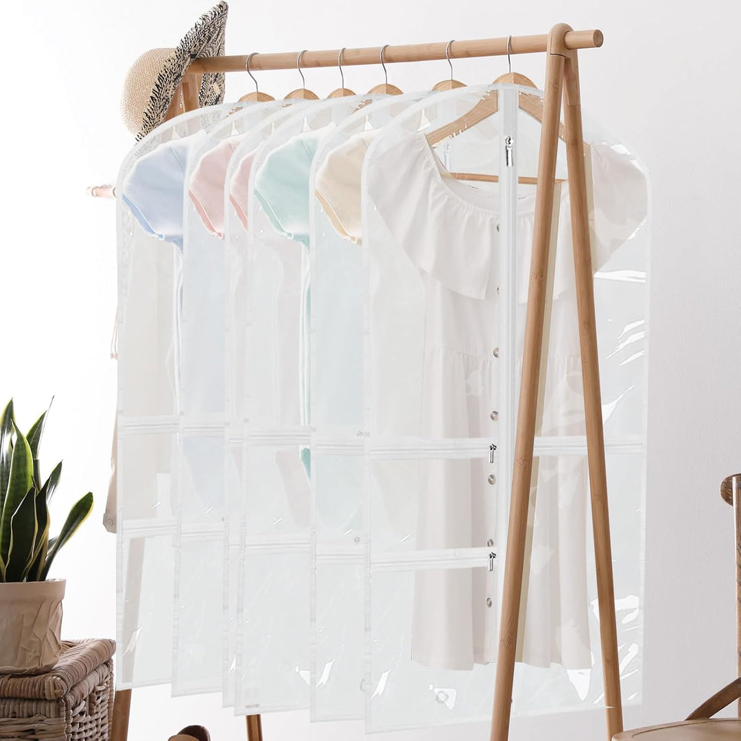 Foldable dancewear garment bags with zipped accessory pockets. Ideal for costume protection, storage & travel organization.
