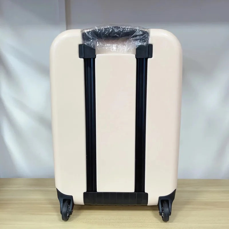 Durable hard shell rolling luggage, ideal for weekend trips & extended travel; unisex and practical.