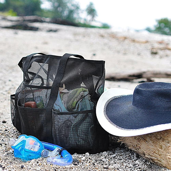 Large capacity mesh beach bag with 9 organizer pockets, ideal for family travel to the pool or beach.