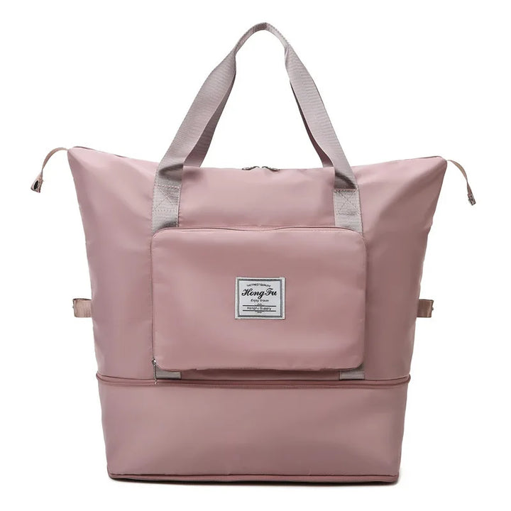Lightweight folding duffle bag shown compactly folded, ideal for easy storage or as an extra bag.