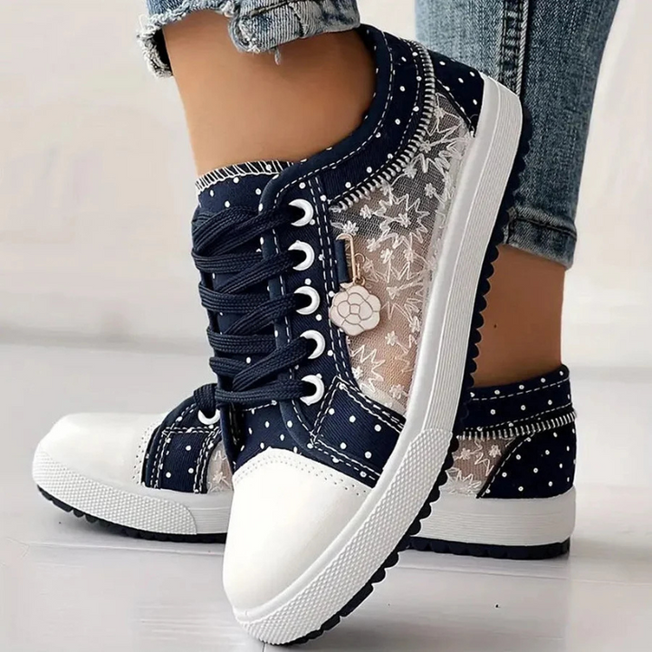 Unisex black sneakers with a breathable upper and cushioned arch support for walking