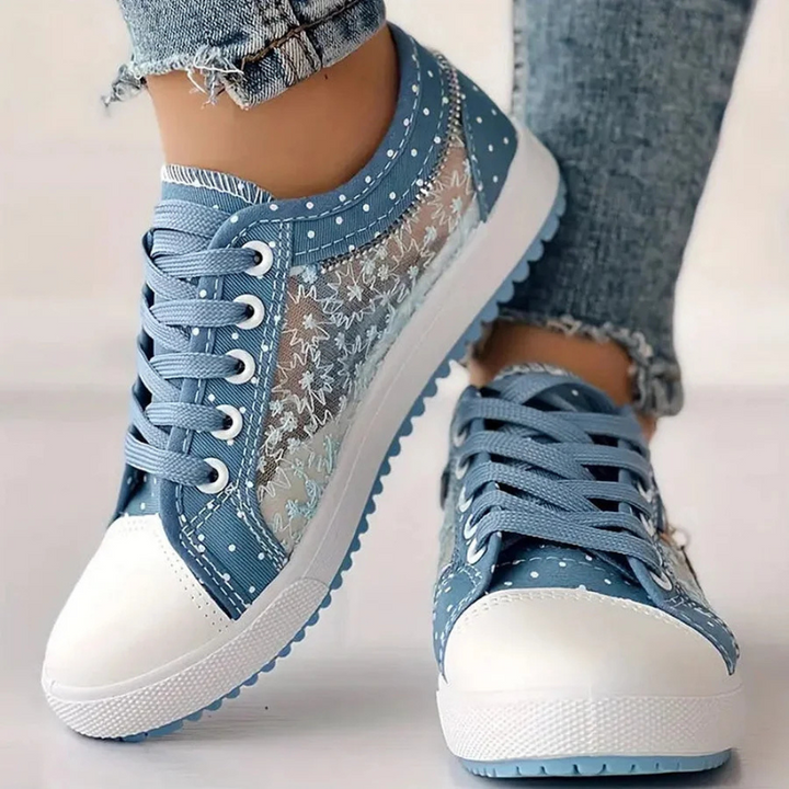 Close-up of unisex comfort sneakers showing arch support and breathable mesh material
