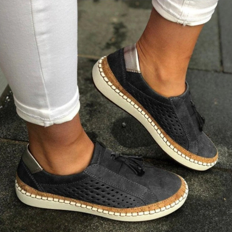 Unisex slip-on shoes with strong arch support and breathable fabric, designed for ultimate walking comfort